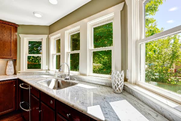 Bay window installation adding space and light to living room